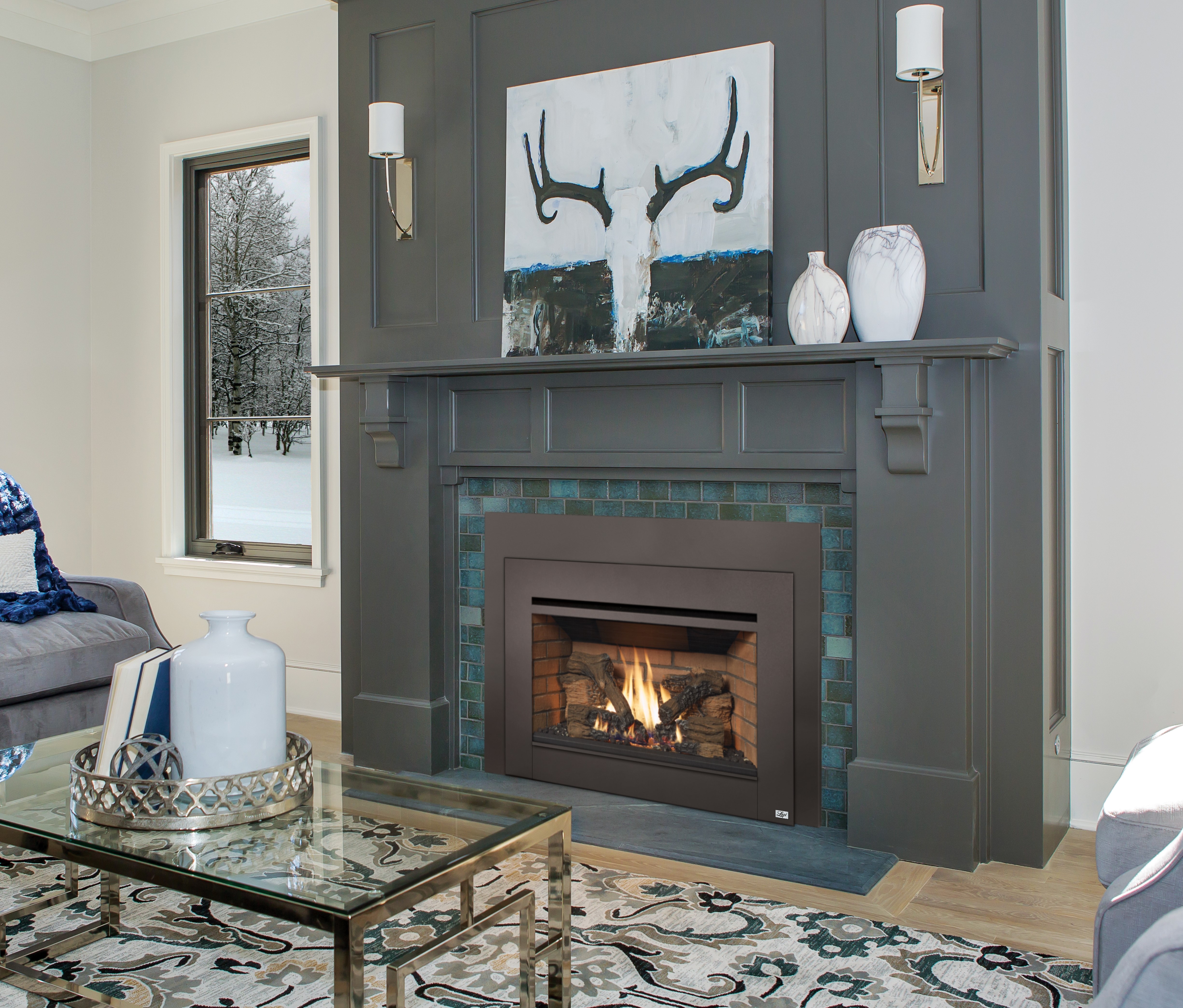 Image of an efficient Gas insert made by Avalon featuring a realistic wood log set.