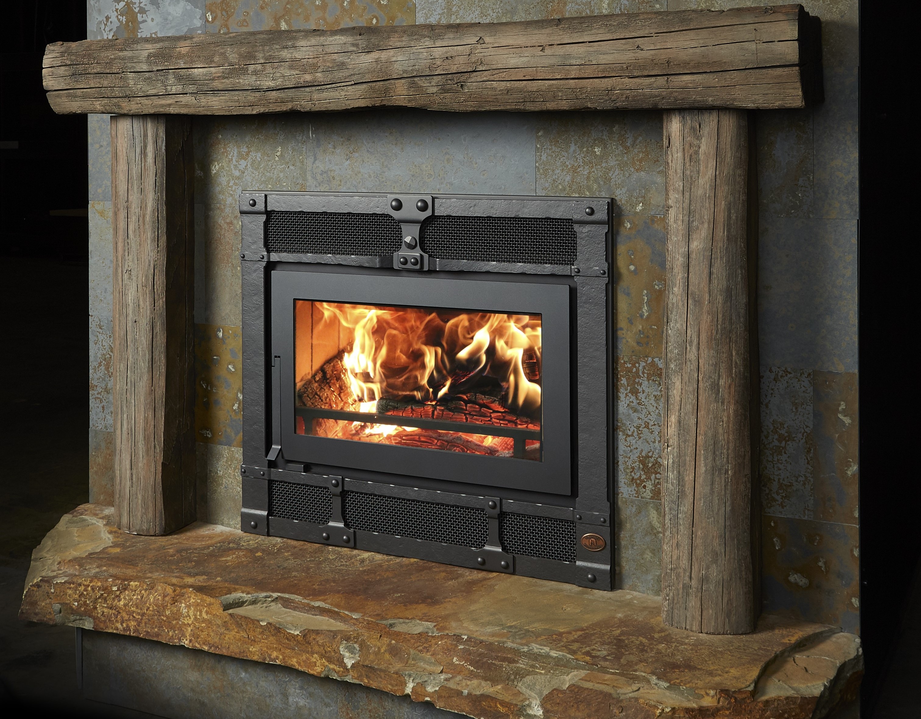 Image of a Travis Industries Wood Fireplaces which links to our Wood Fireplace page.