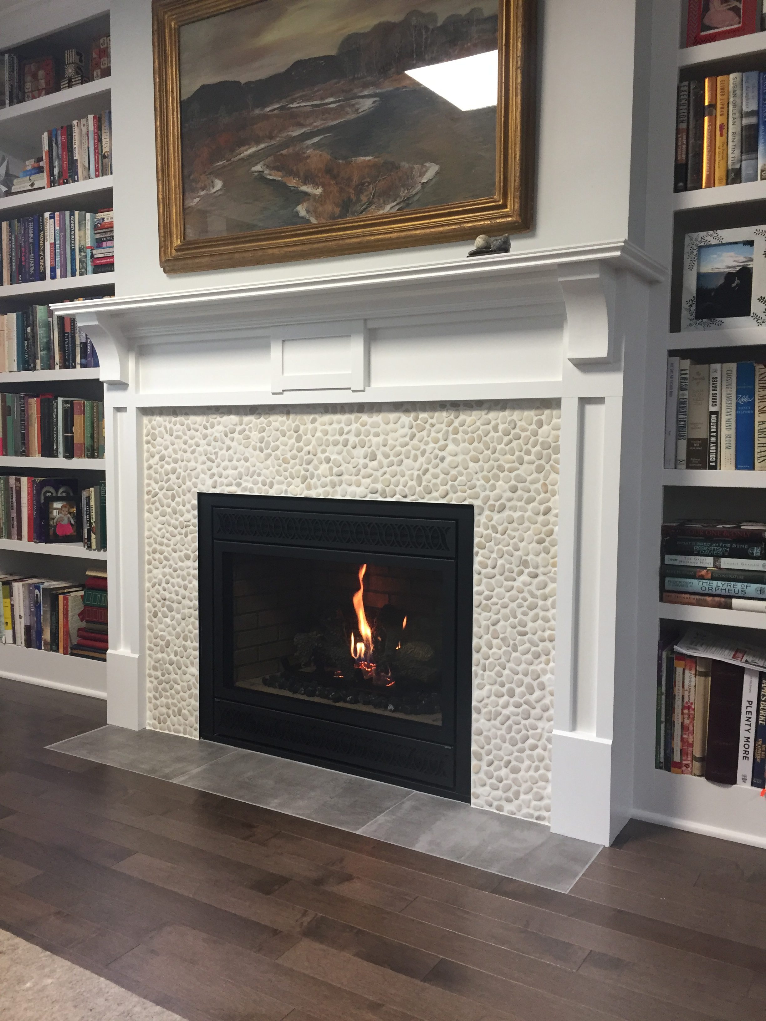 Image of a traditional 564 SpaceSaver gas fireplace by Fireplace X featuring traditional tile facing and mantle.