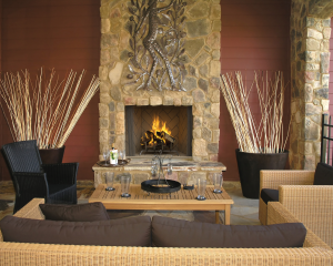 Image of a traditional 6000 Series outdoor wood fireplace with a link to the product page.