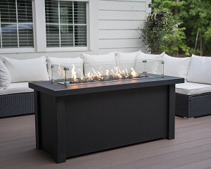 Image of a Linear Fire Pit Table by Stoll Industries featuring a sleek black finish and a link to their product page.